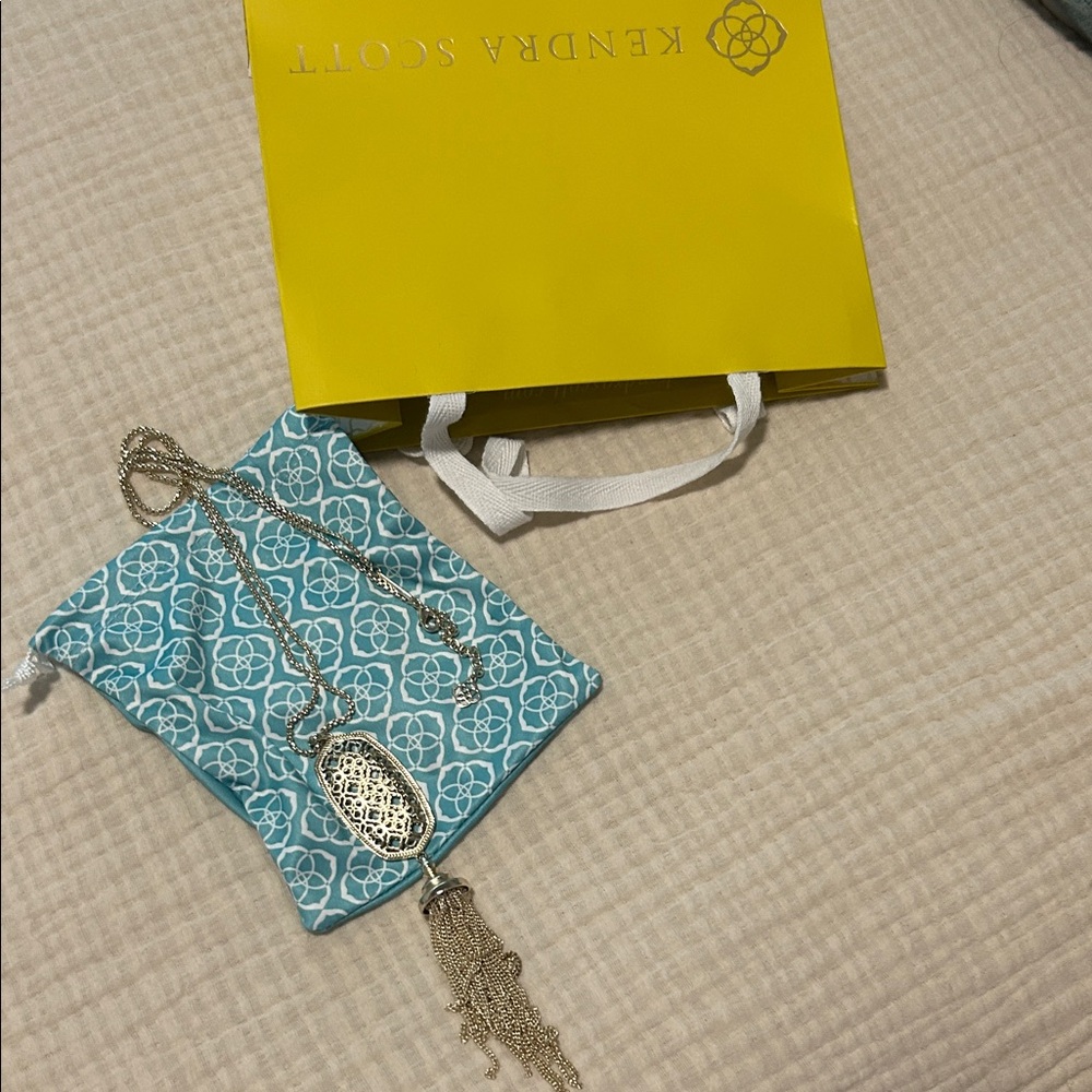 Kendra Scott gold FiligrePendant Necklace with Tassel. Never worn. Stored in bag